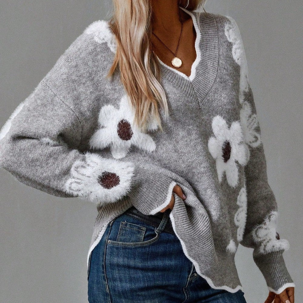 THEA | ELEGANTE TRUI MET V-HALS EN BLOEMENPRINT