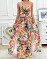 Jurk met bloemenprint en kettingdetails, split aan de dij en strik