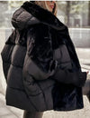 Oversized pufferjack met capuchon van imitatiebont – ultrawarme streetstyle
