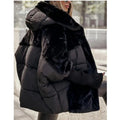 Oversized pufferjack met capuchon van imitatiebont – ultrawarme streetstyle