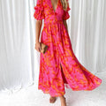Alva - Elegante maxi-jurk met V-hals en pofmouwen