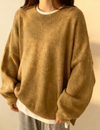 De oversized fleece trui