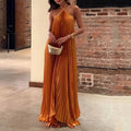 Kyla - Chique maxi-jurk met plooien en halternek