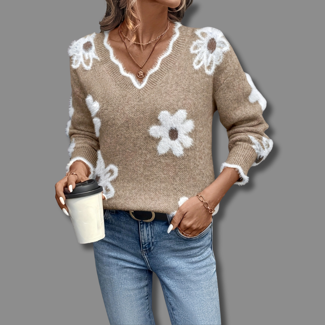 THEA | ELEGANTE TRUI MET V-HALS EN BLOEMENPRINT