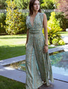 Isla Luxe – Jumpsuit met print, open rug en wijde pijpen